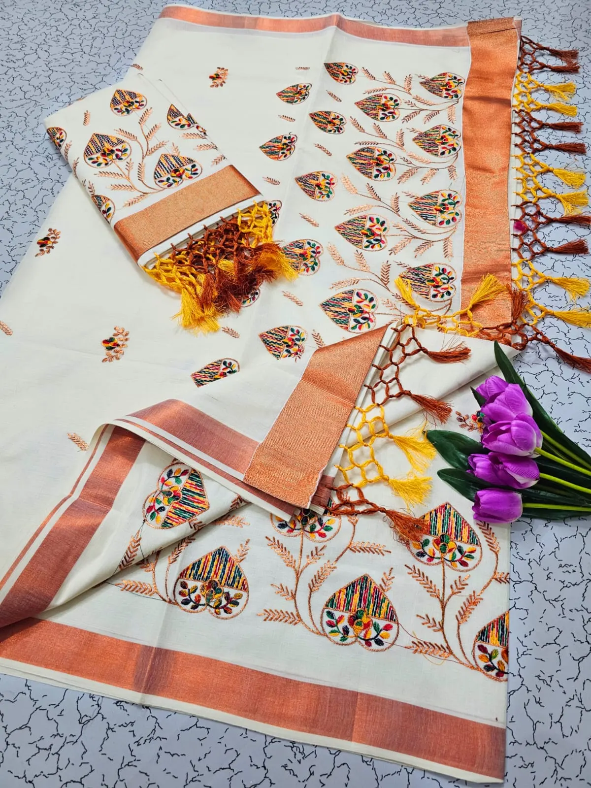 Off White Kasavu Cotton Saree with Multicolor Floral Embroidery and Copper Tone Border